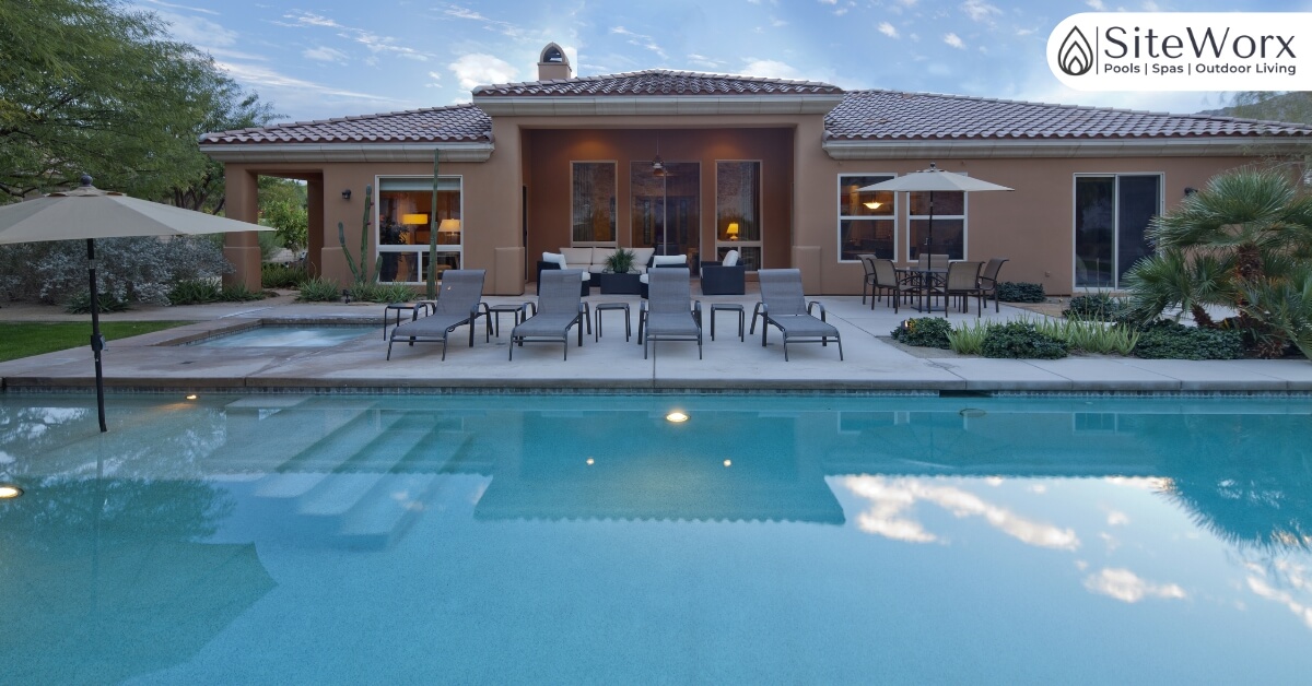 large pool in front of a house